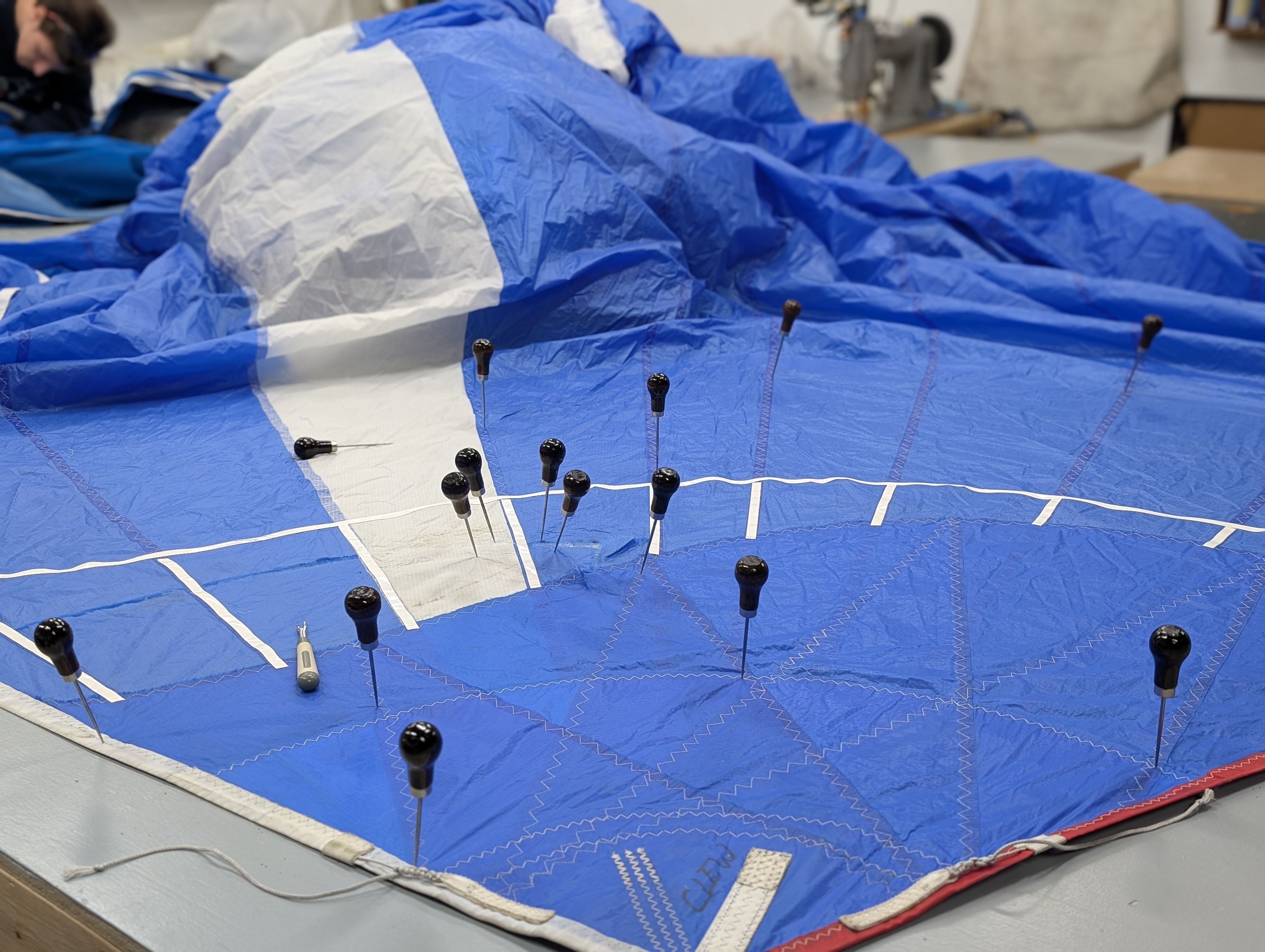 Professional sail repair work in progress